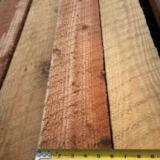 Rough sawn doug fir lumber 2x8 showcasing natural character and texture for construction projects.