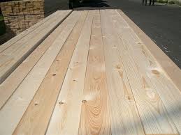 1x8x10 ponderosa pine lumber showcasing smooth surfaces and uniform dimensions for woodworking and construction.